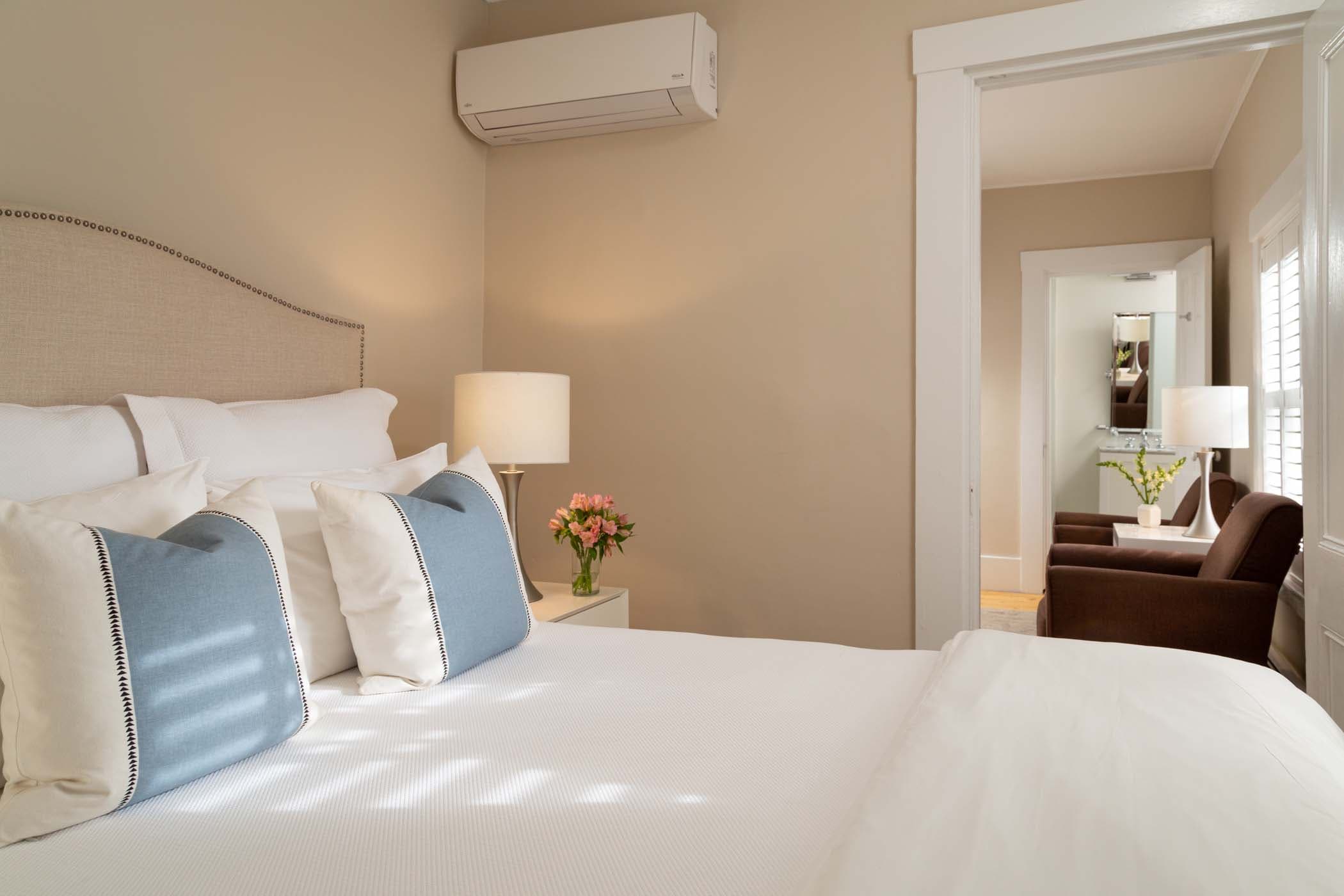 A view of the sitting area from the bedroom in Room 14 at Chatham Inn