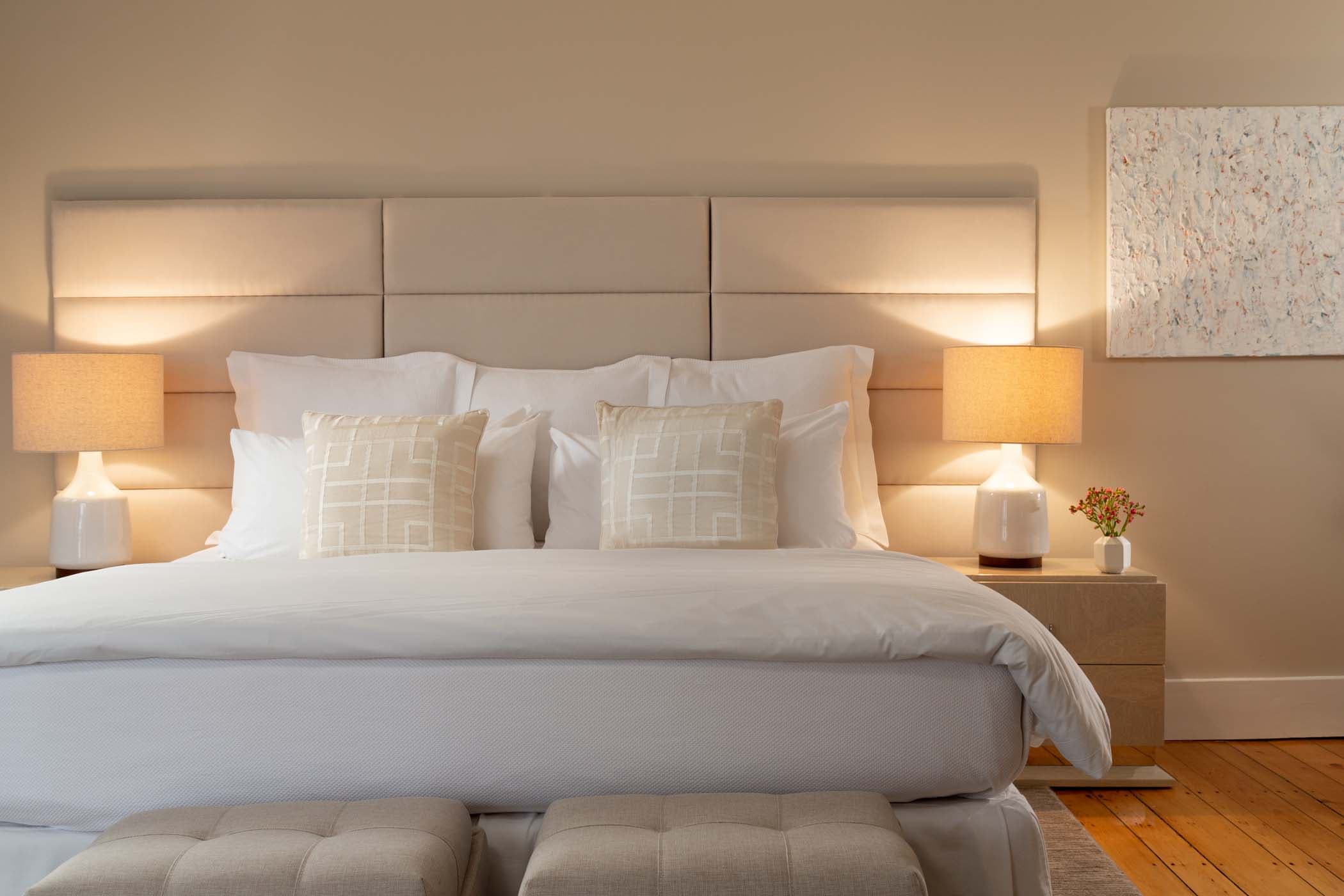 A king bed in Room 3 at Chatham Inn